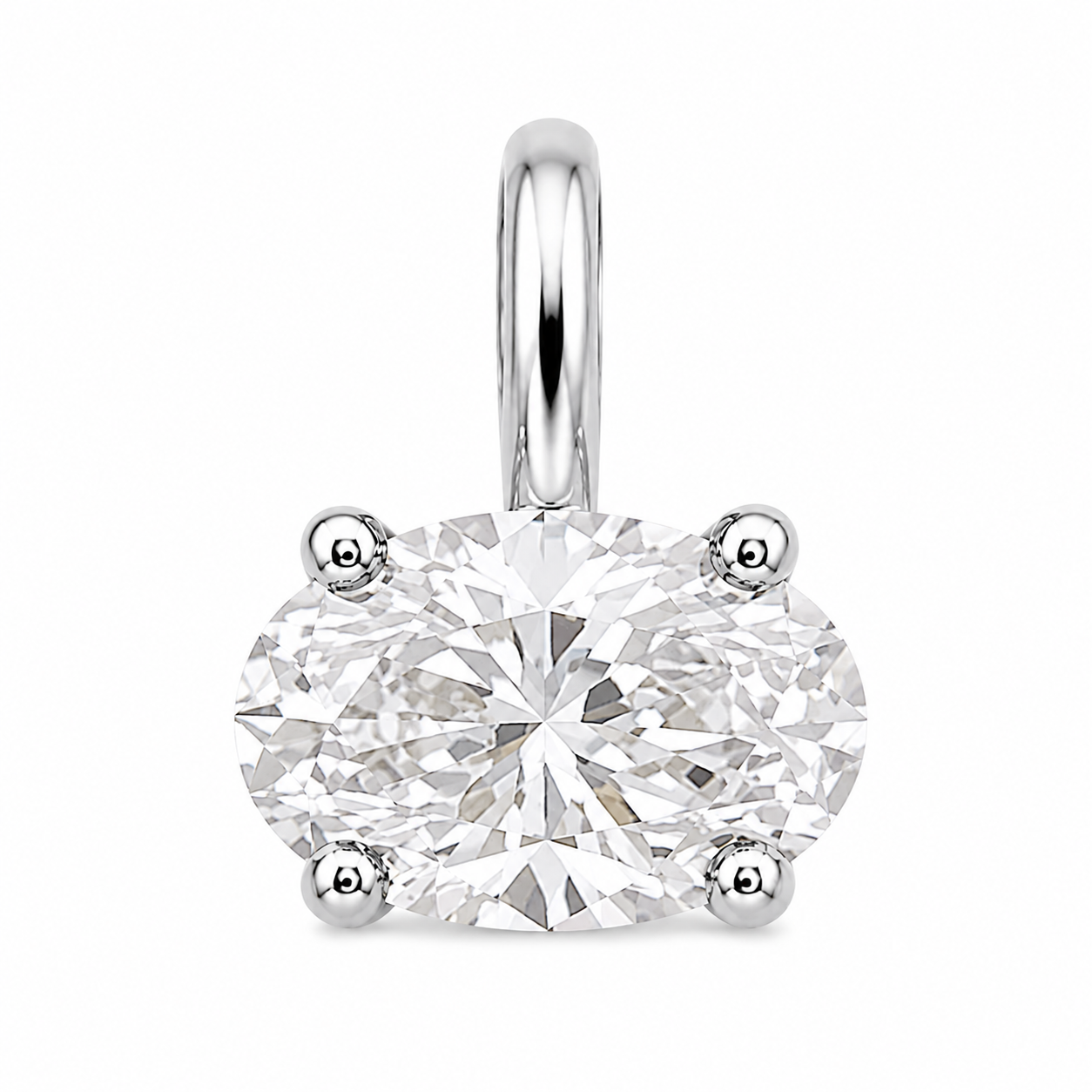An oval-cut diamond solitaire pendant in a four-prong silver setting with a polished bail, shown on a solid white background.